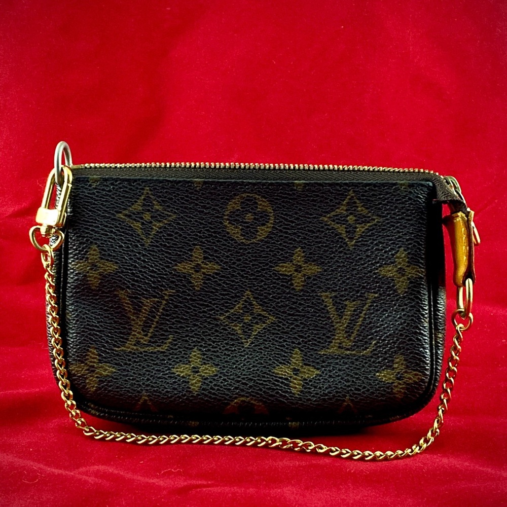 Authentic Vuitton Mini Pochette